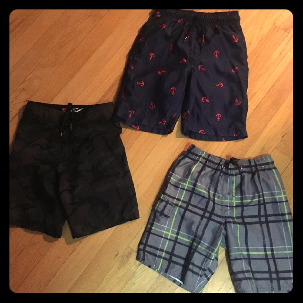 Set of 3 boys bathing suits. Fits 6-7.